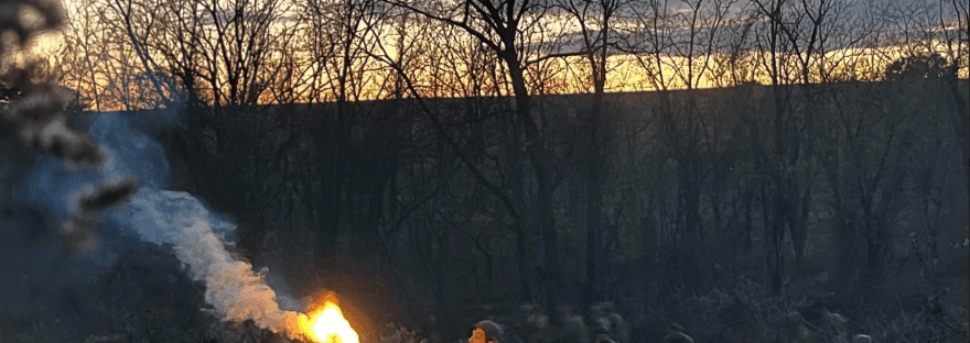 two doughboys launching a trench mortar